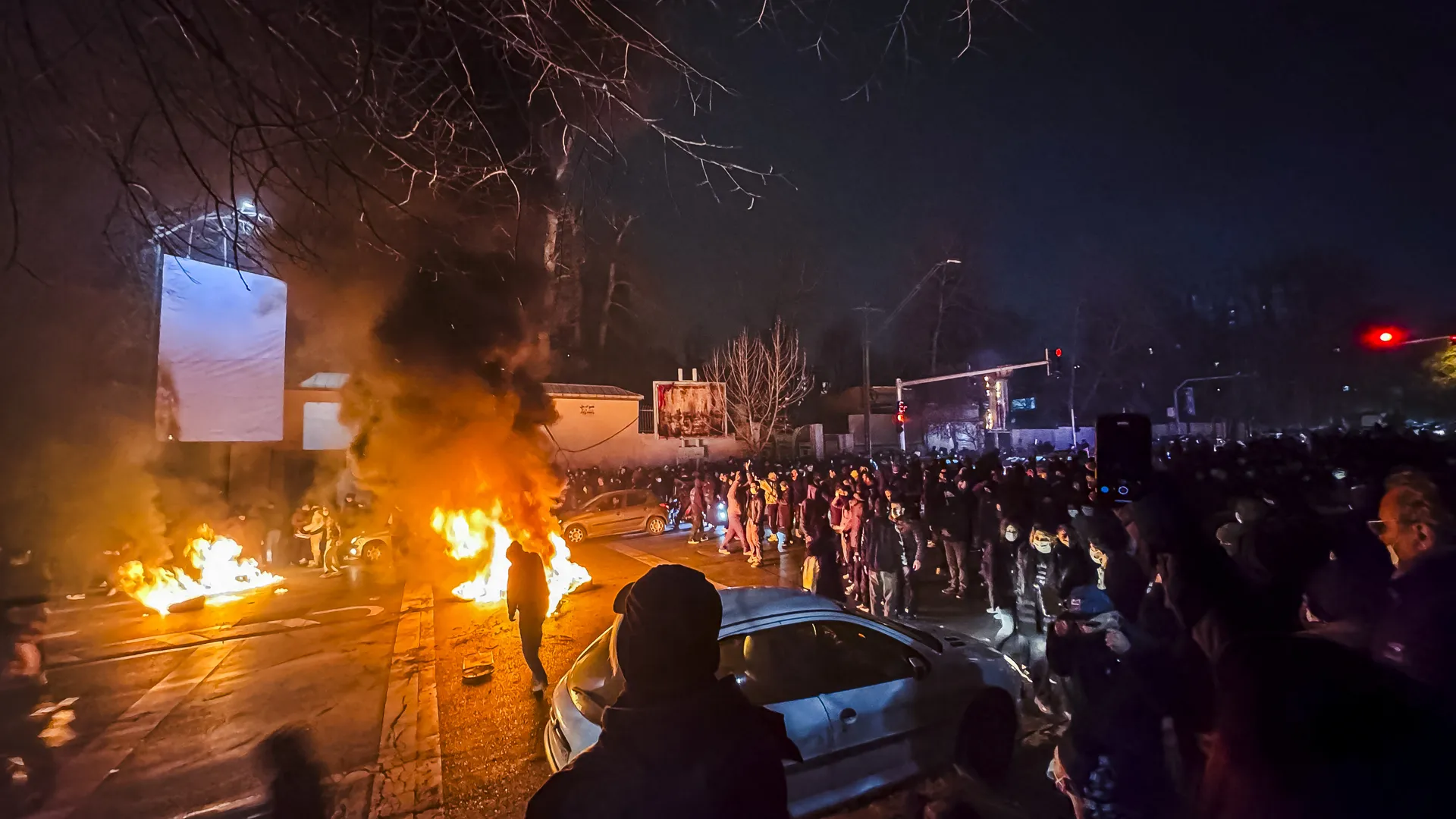 Iran protests anger and growing crowds in Tehran